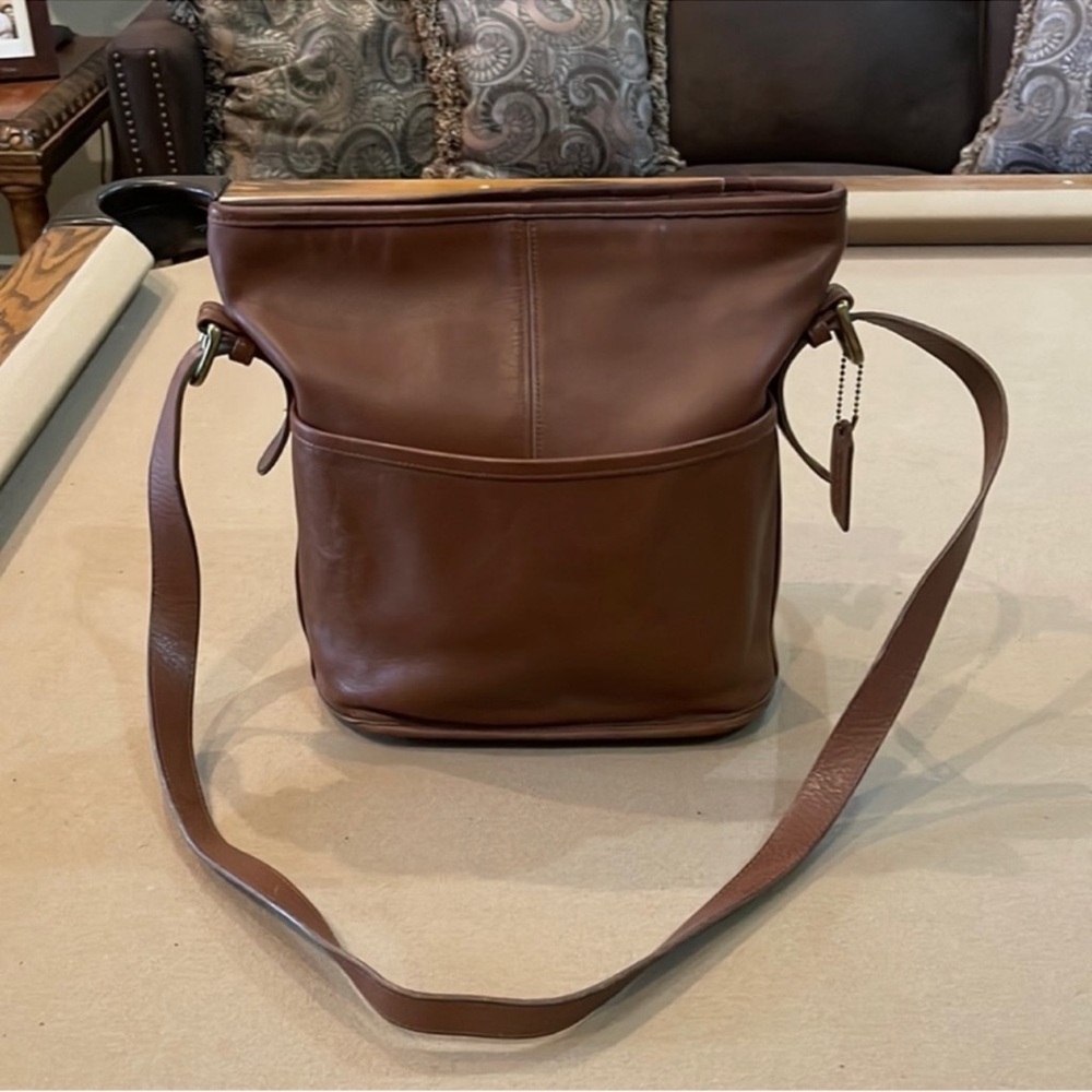 Coach ladies bucket bag price is firm (pending vacation hold until October)